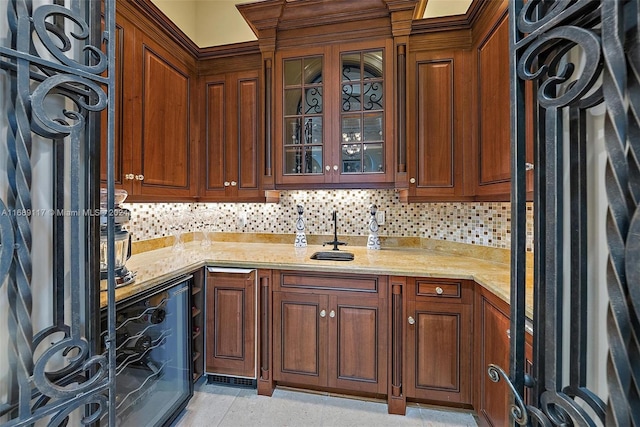 kitchen with light stone counters and backsplash