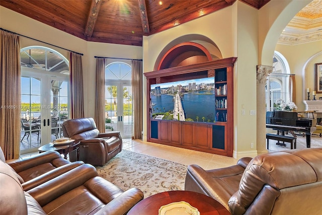 tiled living room featuring french doors, plenty of natural light, beam ceiling, and wood ceiling