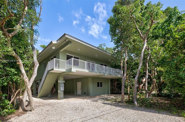 view of front of property with a carport