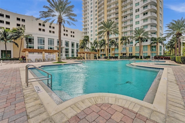 view of swimming pool with a patio area