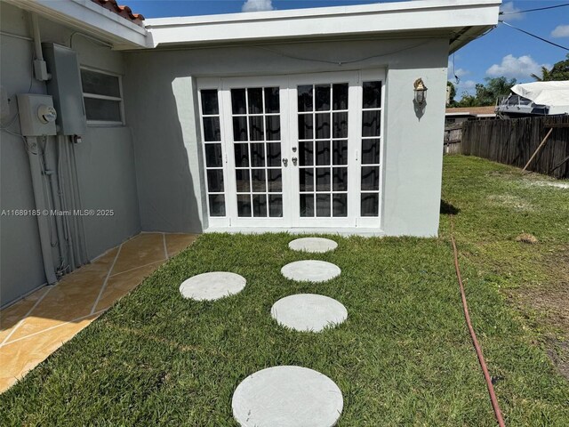 view of yard featuring french doors