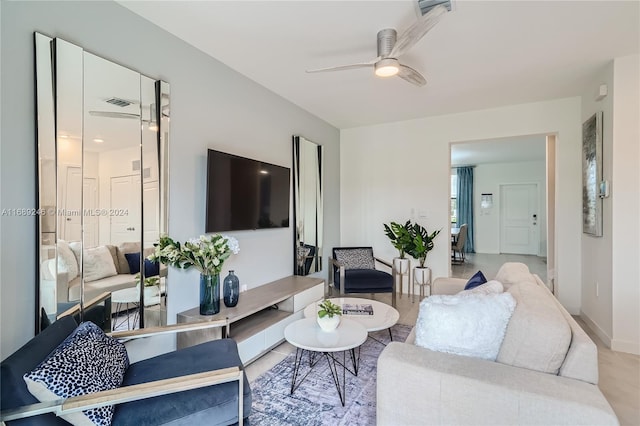 living room with ceiling fan