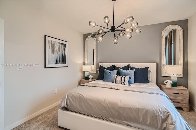 bedroom with carpet floors and a chandelier