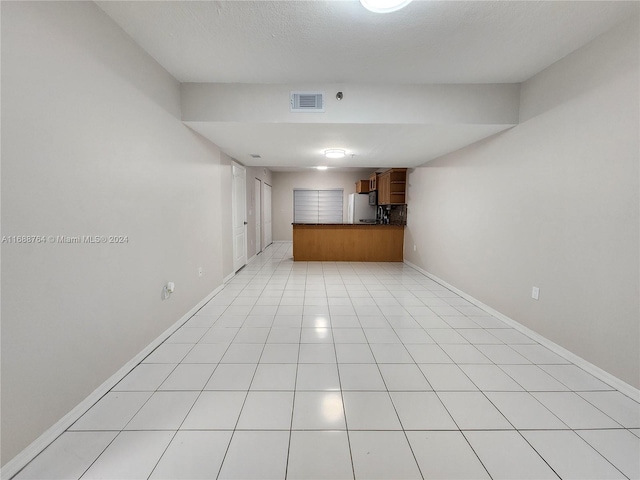 interior space featuring a textured ceiling