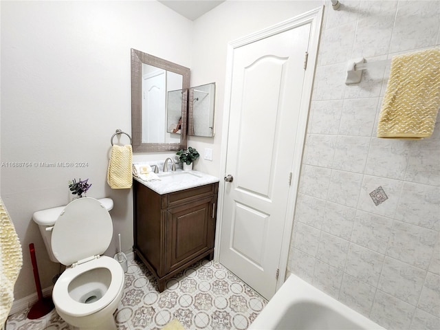 bathroom featuring toilet and vanity