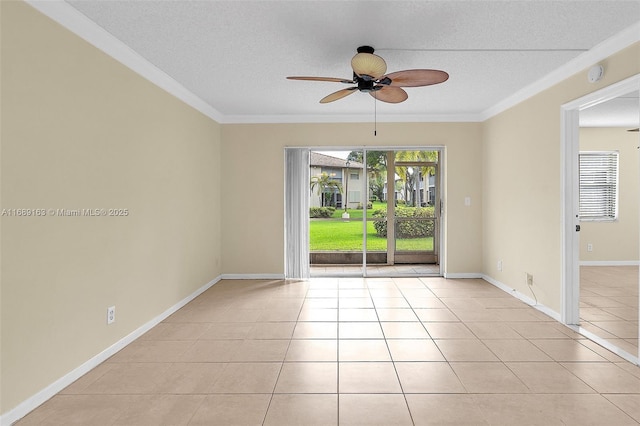 empty room with light tile patterned flooring, ornamental molding, ceiling fan, and a textured ceiling