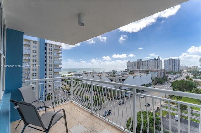 balcony featuring a water view