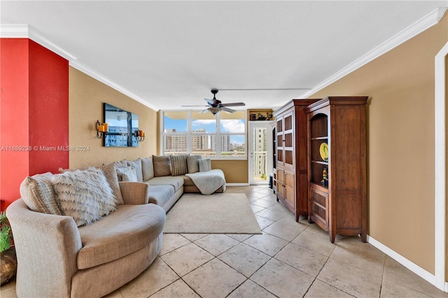 living room with light tile patterned floors, ceiling fan, and ornamental molding