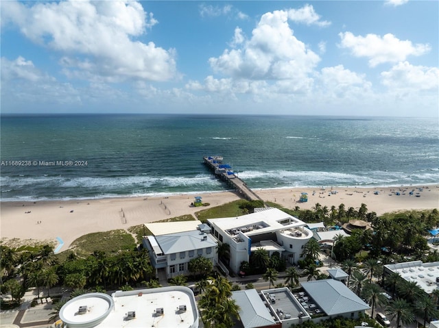 bird's eye view with a beach view and a water view