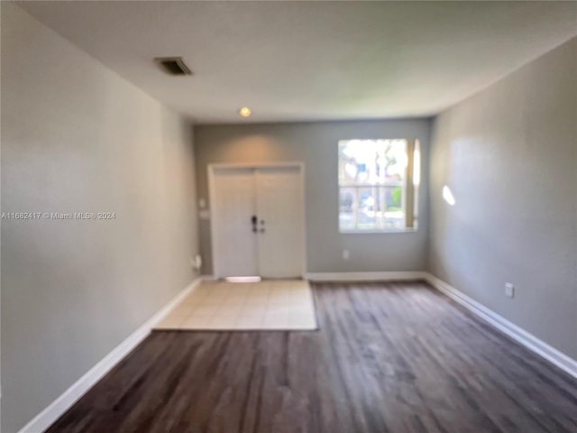 foyer with hardwood / wood-style flooring