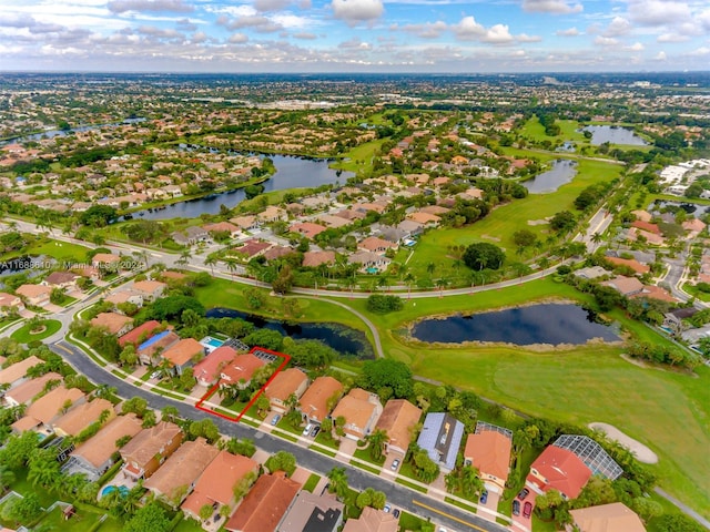 bird's eye view with a water view