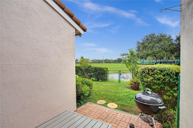 view of yard with a water view