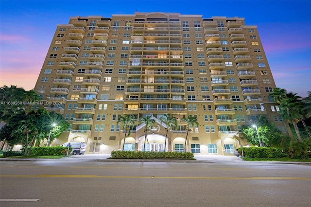 2665 SW 37th Ave Unit 202, Miami, FL 33133 - property at dusk featuring a view of apartment building / complex