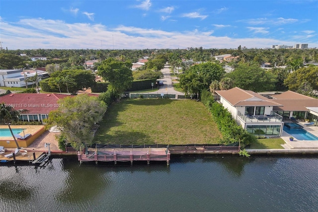 drone / aerial view with a water view