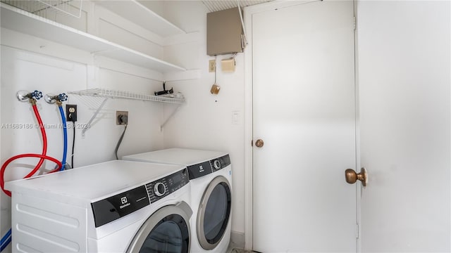 laundry room with separate washer and dryer