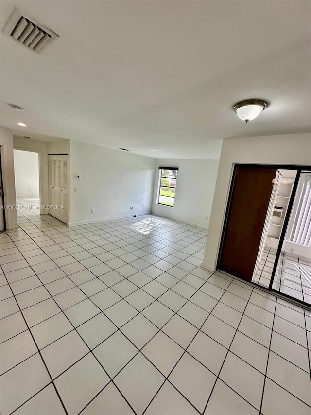 view of tiled spare room