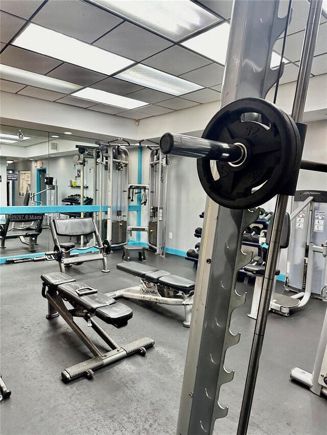 workout area with a drop ceiling