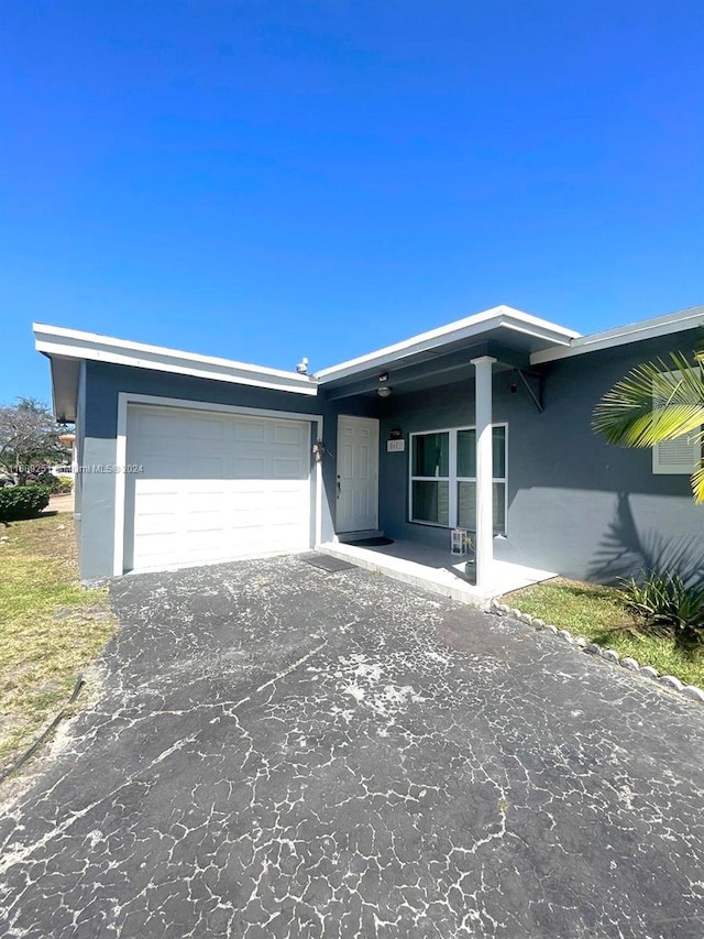 view of front of property featuring a garage