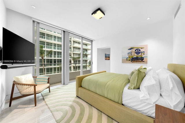 bedroom featuring light wood-type flooring