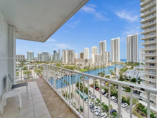 balcony featuring a water view