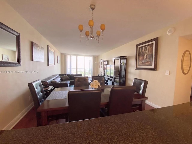 dining space featuring an inviting chandelier