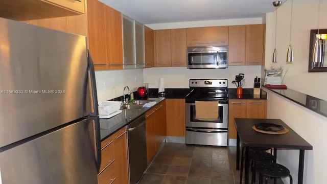 kitchen featuring stainless steel appliances and sink