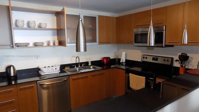 kitchen with appliances with stainless steel finishes and sink