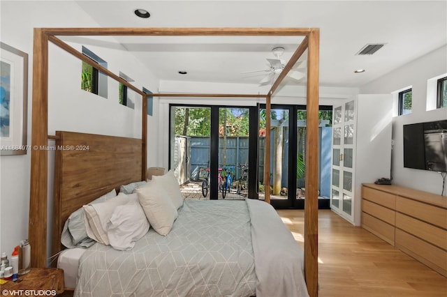 bedroom featuring access to exterior, light wood-type flooring, and ceiling fan