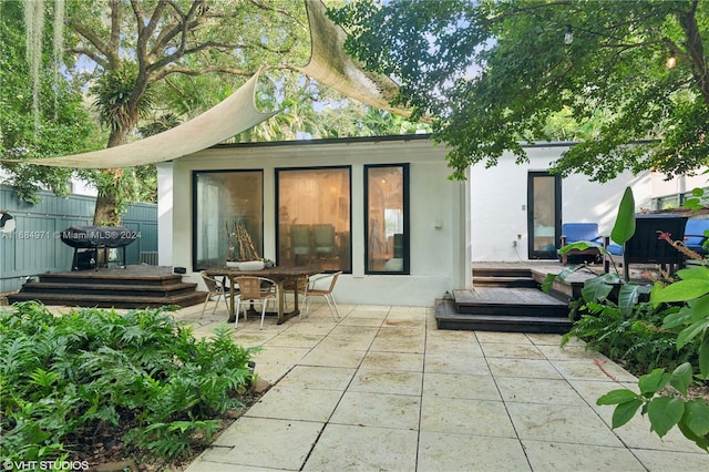 back of house featuring a patio