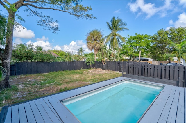 view of pool with a deck