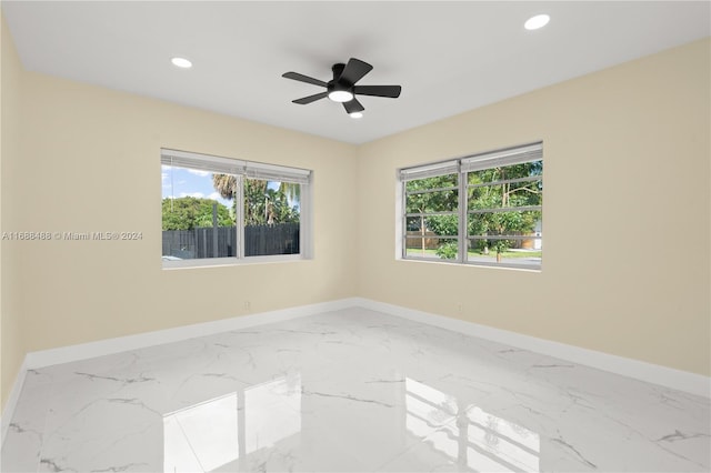 unfurnished room featuring ceiling fan