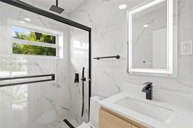 bathroom featuring walk in shower, vanity, and toilet