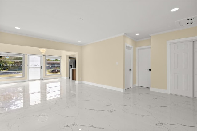 unfurnished room featuring ornamental molding