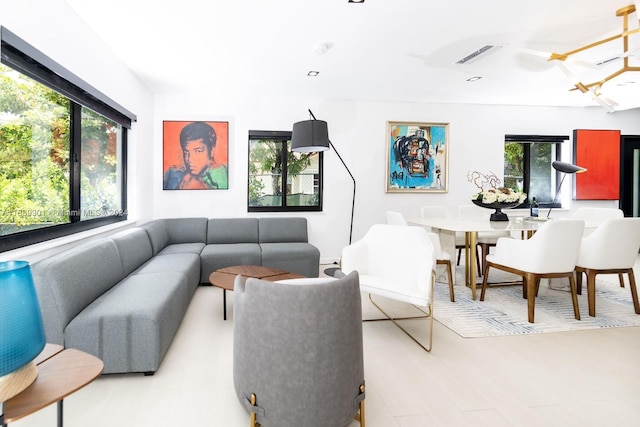 living room featuring hardwood / wood-style floors and a wealth of natural light