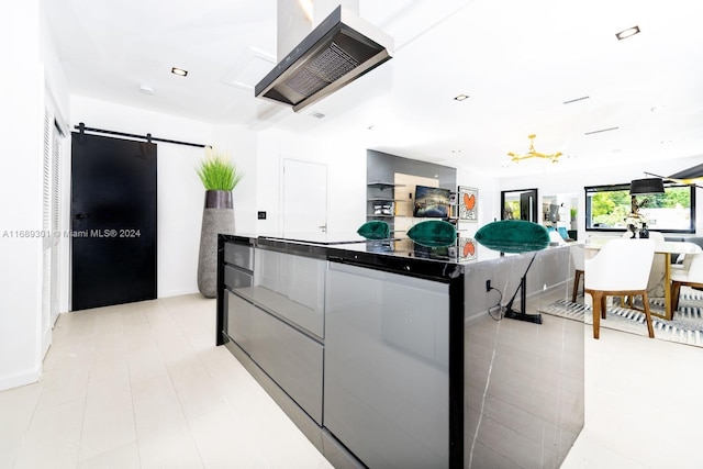 kitchen with a spacious island and a barn door