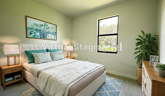 bedroom with wood-type flooring