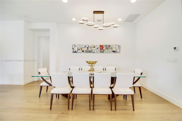 dining room with light hardwood / wood-style flooring