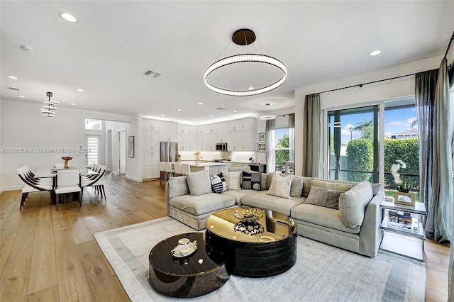 living room with light wood-type flooring