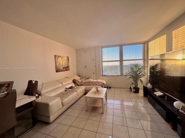 living room with light tile patterned flooring