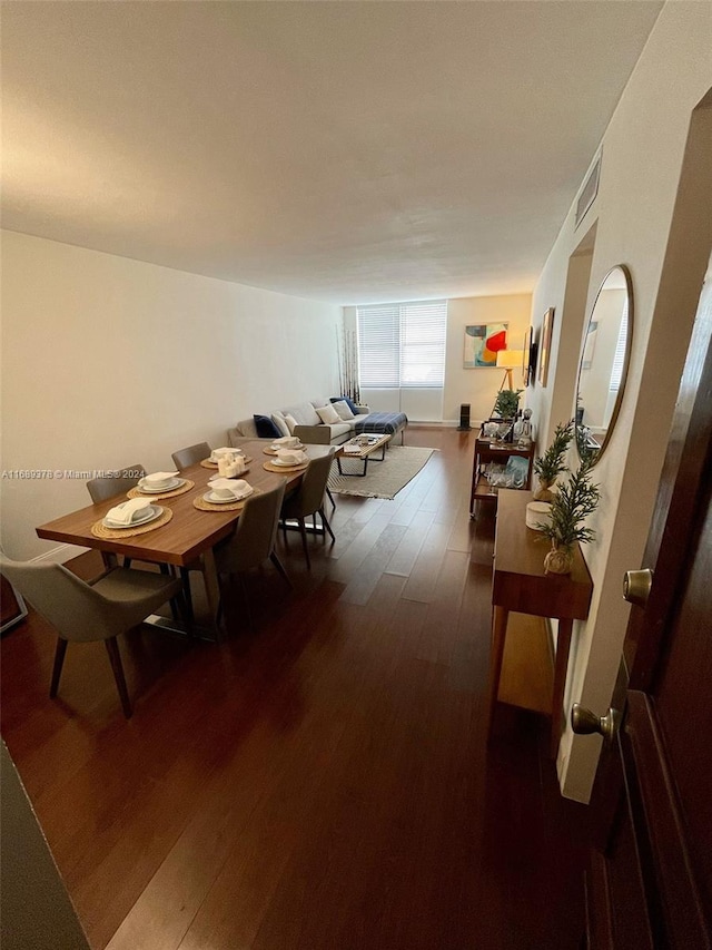 dining room featuring dark hardwood / wood-style floors