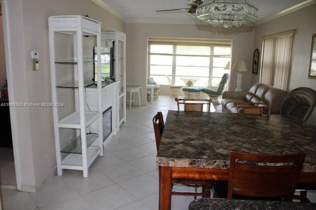 tiled dining room with ornamental molding