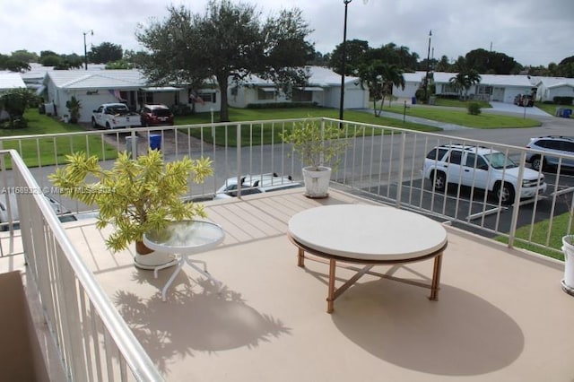 view of patio / terrace with a balcony