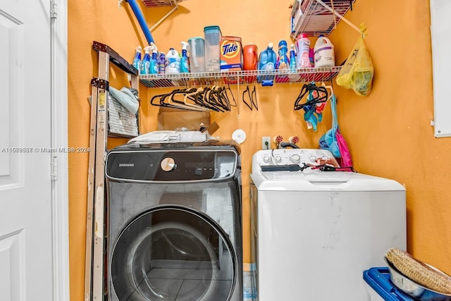 laundry area featuring washing machine and dryer