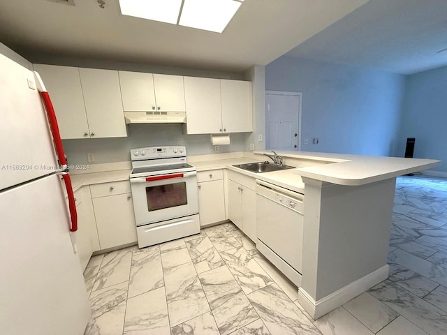 kitchen featuring white cabinetry, kitchen peninsula, sink, and white appliances