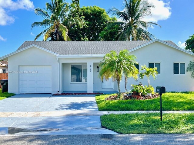 single story home with a garage