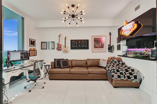 living room featuring a chandelier and light tile patterned flooring