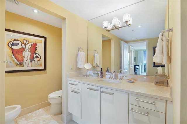 bathroom featuring tile patterned flooring, toilet, recessed lighting, vanity, and baseboards