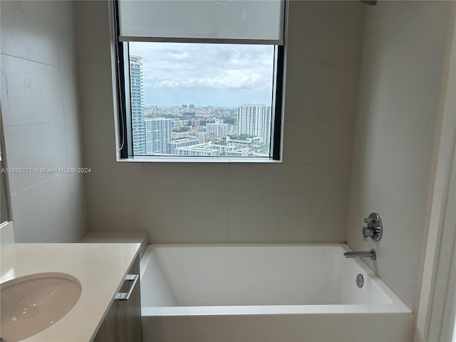 bathroom with vanity and shower / washtub combination