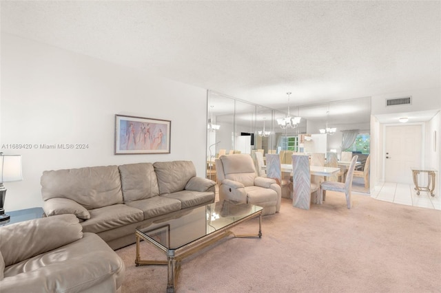 carpeted living room featuring a textured ceiling