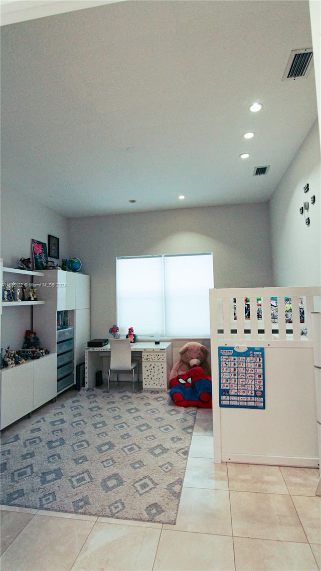 game room featuring tile patterned floors